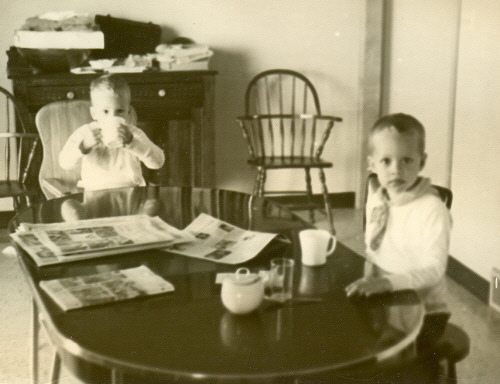 Nate and Kier at breakfast table at grandparents' house in Greenville, Ohio